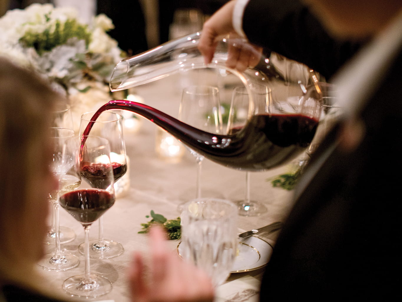 Pouring Jordan Cabernet Sauvignon out of a decanter