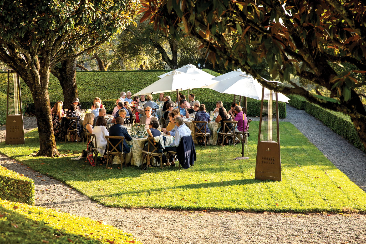Guests sit on the lower lawn at Jordan during the Bounty of Sonoma County dinner