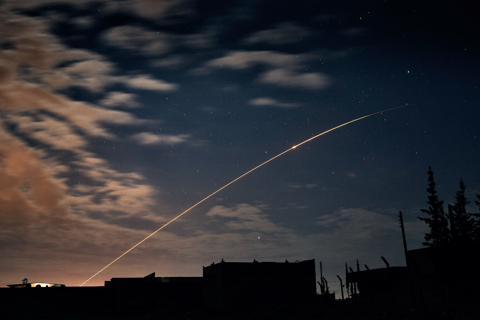 April 18, 2013, Naqqarin, Aleppo.
I counted more than fifty rockets fired by Syrian Government forces that night. They arced silently up through the clouds toward the northern countryside of Aleppo.