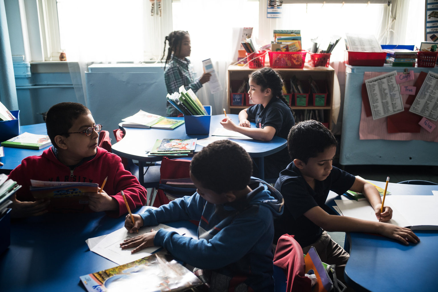 Students in Milagros Ramirez’s second-grade class at Public School 188 on the Lower East Side of Manhattan. Last school year, 47 percent of the students there were homeless. Credit Todd Heisler/The New York Times